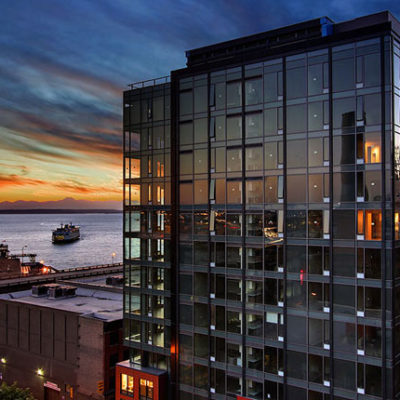 Building by the water sunset